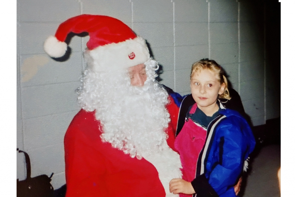 Emmy and Santa 2002. She asked for a little brother.